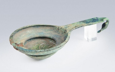 Etruscan ceremonial strainer. 6th-5th BC. Bronze.