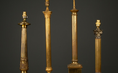Four gilt metal table lamps