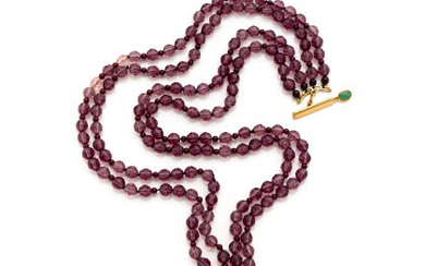 Four strand faceted glass bead necklace with garnet spacers and a yellow gold chinese coin clasp, g 134.38 circa, length...