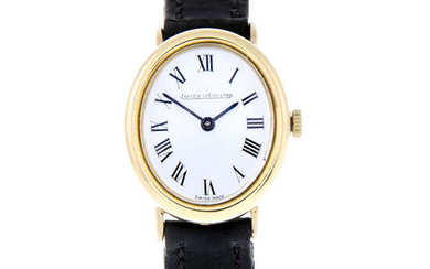 JAEGER-LECOULTRE - a lady's yellow metal wrist watch.