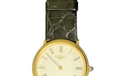 LONGINES; an 18ct yellow gold gentleman's wristwatch, on black leather...