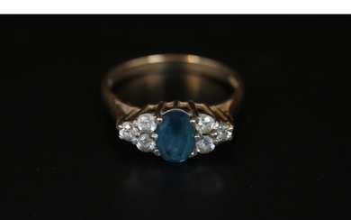 Ladies 9ct Gold Blue Topaz and Diamond set ring with open mo...