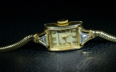 Ladies Vintage 14 Karat Yellow Gold Movado Watch with