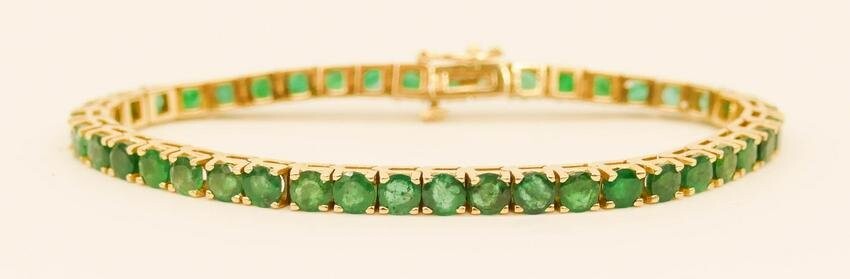 Lady's 8ctw Emerald 14k Tennis Bracelet