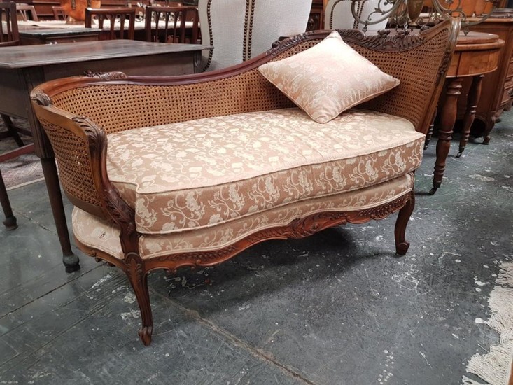 Louis XV Style Carved Walnut Chaise or Daybed, with caned back and yellow upholstered seat, on cabriole legs