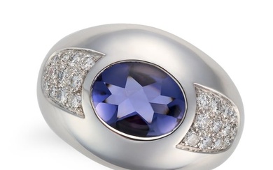 MAUBOUSSIN, AN IOLITE AND DIAMOND RING in 18ct white gold, set with a fancy cut iolite accented by