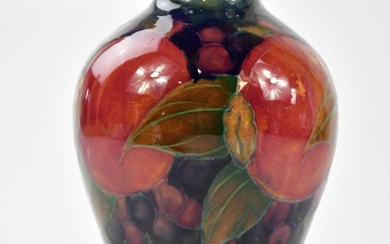 MOORCROFT; a 'Pomegranate' pattern vase, height 15cm.Condition Report There is...