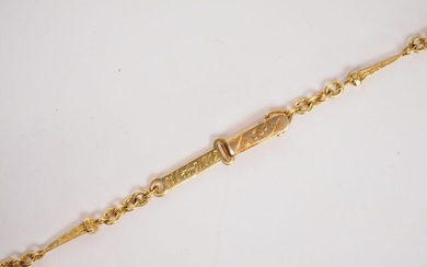 Necklace in yellow gold with nail decoration.