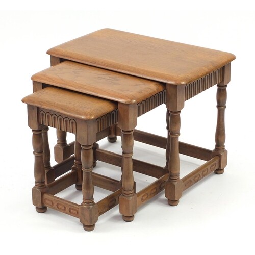 Nest of three elm occasional tables, the largest 46cm H x 60...
