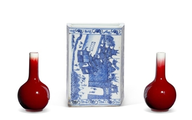 PAIR OF CHINESE PORCELAIN COPPER-RED GLAZED SMALL BOTTLE VASES, AND A CHINESE BLUE AND WHITE PORCELAIN PILLOW, THE VASES QING DYNASTY, 19TH CENTURY, THE PILLOW FIRST HALF 20TH CENTURY