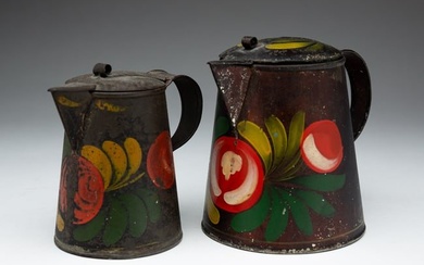 PAIR OF POLYCHROME PAINTED TIN SYRUP PITCHERS.