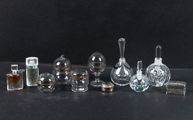 PERFUME BOTTLES/BOTTLES, NIPPERBOXES AND PERFUME BOTTLES. 11 parts, glass and metal, including Orrefors.