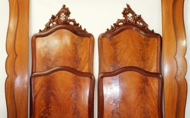 Pair Italian mahogany twin beds with crests