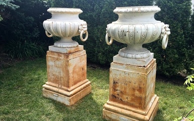 Pair of Val d'Osne Urns on J.L. Mott Plinths