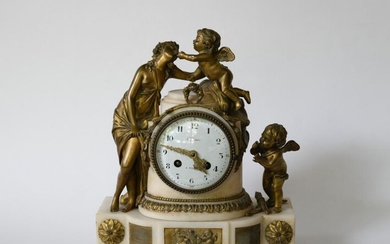 Pendulum clock in bronze and alabaster with a woman's decoration under the enchantment of two loves. Dial signed H. VIAN in Paris.
