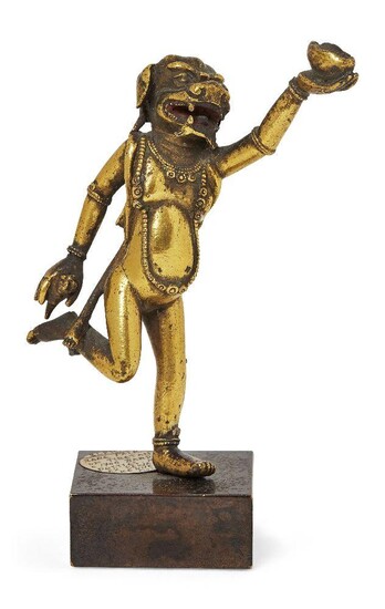 Property of a Gentleman (lots 36-85) A Tibetan gilt-bronze bardo Simha-headed dancing deity, 17th century, richly gilded and cast in energetic posture holding a ritual chopper and a kapala, 9cm high, on metal stand Provenance: Ex Seward Kennedy...