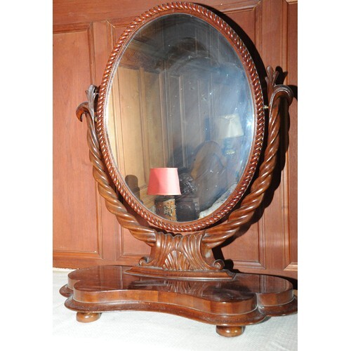 Regency style mahogany oval framed swivel mirror with rope e...