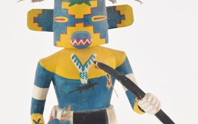Signed vintage Hopi kachina doll. Paint decorated carved wood with feathers. Height of wood 10.25in.