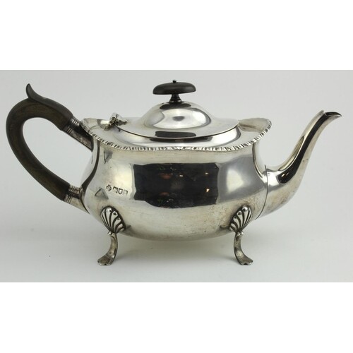 Silver teapot on four splayed feet, hallmarked William Hutto...