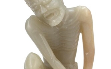 GRAY/RUSSET JADE CARVING OF A LOHAN Qing Dynasty...