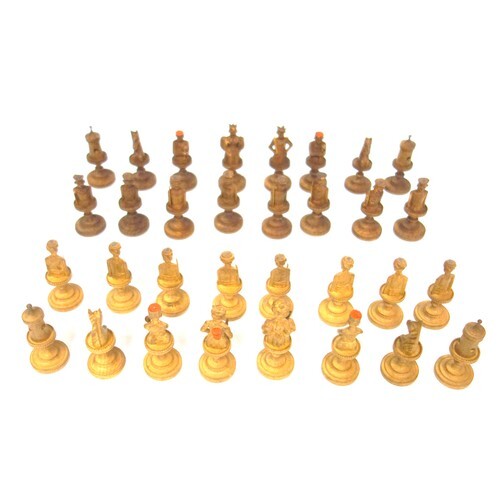Swiss light and dark carved wood chess set, mostly in the fo...