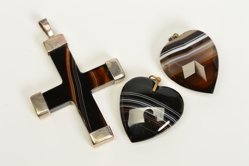 THREE BANDED AGATE PENDANTS, the first a heart, the second a...
