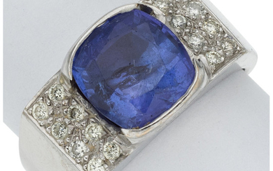 Tanzanite, Diamond, White Gold Ring The ring features a...