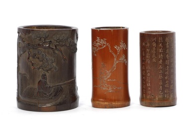 Three Chinese bamboo brushpots. Bitong. The larger one carved with a fisherman...