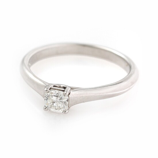 Tiffany & Co.: A diamond solitaire ring set with a Lucida-cut diamond weighing app. 0.30 ct., mounted in platinum. Size 50.5.