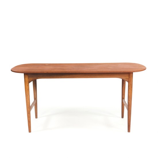 Torsten Johansson: Rare coffee table with legs of Brazilian rosewood, top of solid teak. Made by cabinetmaker A.J. Iversen.