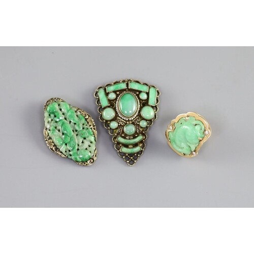 Two Chinese jadeite and gilt metal clips, first half 20th ce...