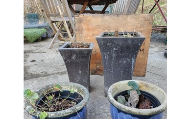 Two blue glazed plant pots and two tall metal plant pots.