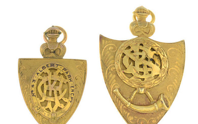 Two early 20th century gold shield medal pendants.