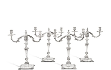 Two matched pairs of George III silver candelabra, John Wakelin...