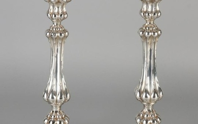 Two silver table candlesticks 800/000, on a round