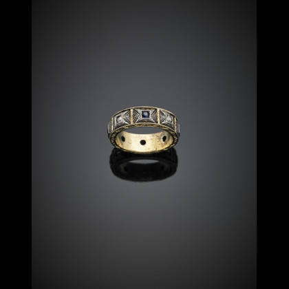 Yellow gold and silver chiselled ring accented with diamonds...