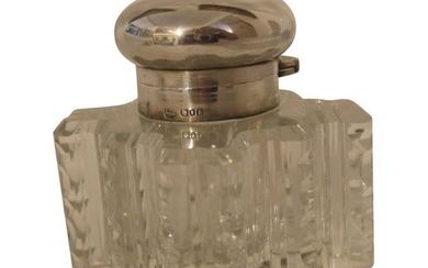 1 Crystal inkwell with silver stopper.