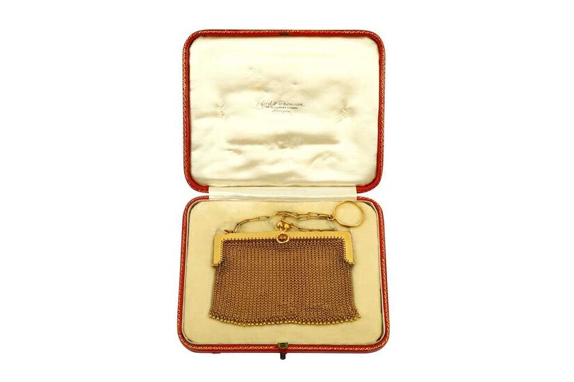 A gold mesh purse, 1908 The finely woven mesh...
