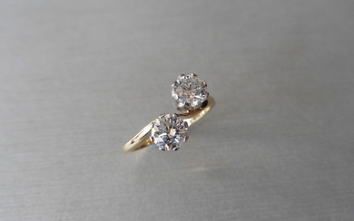 1.40ct diamond 2 stone twist ring. 2 brilliant...