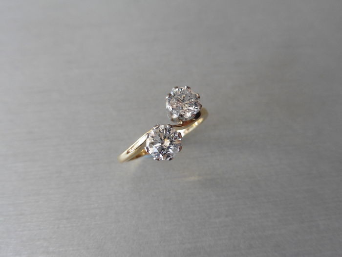 1.40ct diamond 2 stone twist ring. 2 brilliant...