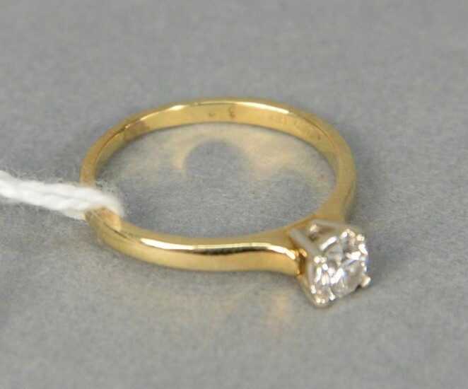 18 karat yellow gold and diamond engagement ring with