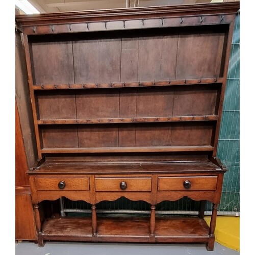 19th Century oak two stage pot board dresser, the moulded to...