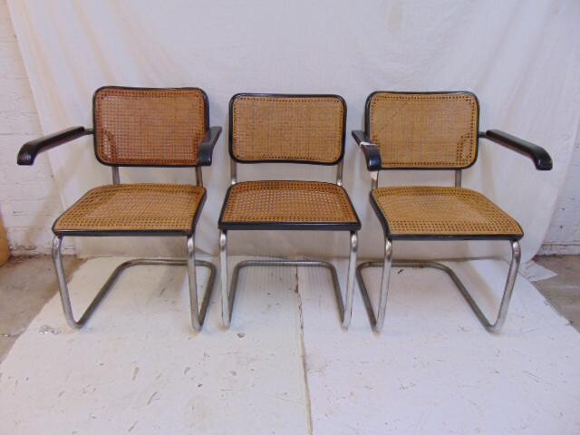 3 Marcel Breuer for Thonet caned chairs, 2 arm, one