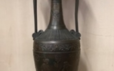 A 19th Century continental bronze and marble urn decorated with classical subjects, H. 70cm.