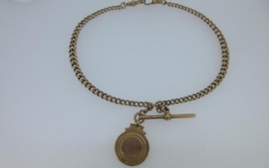 A 9ct gold double albert watch chain and pendant medal