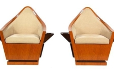 A Pair of Art Deco Birch Veneer Swivel Club Chairs