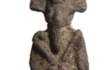 An Egyptian bronze figurine of Osiris, Late Period