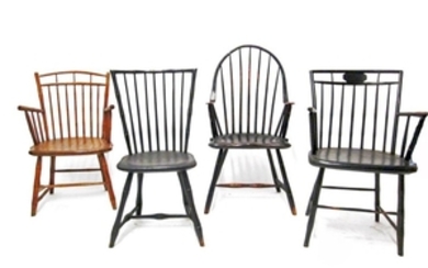 Four Windsor arm and side chairs: black painted rod-back,...