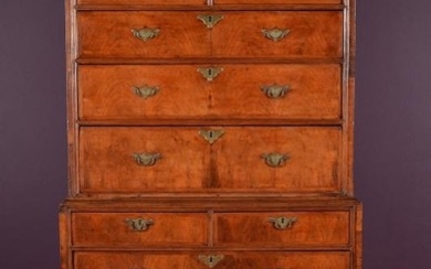A George II figured walnut chest on stand