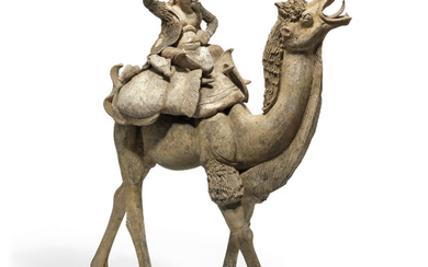 A MASSIVE PAINTED POTTERY FIGURE OF A CAMEL AND RIDER, TANG DYNASTY (618-907)